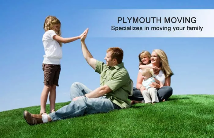 Family relaxing on a grassy hill, with the caption Plymouth Moving specializes in moving your family